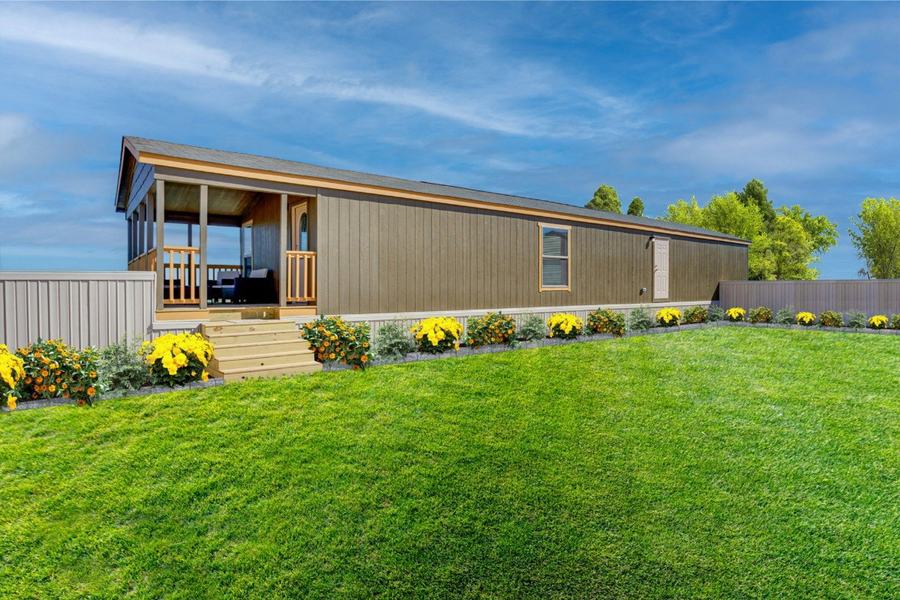 Alondra home with covered porch on open land